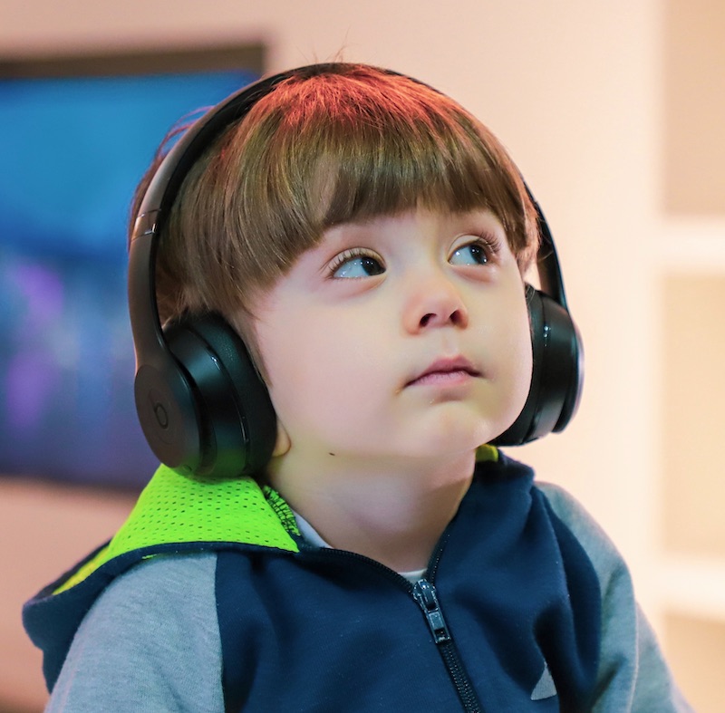 kid with headphones Alireza Attari on Unsplash